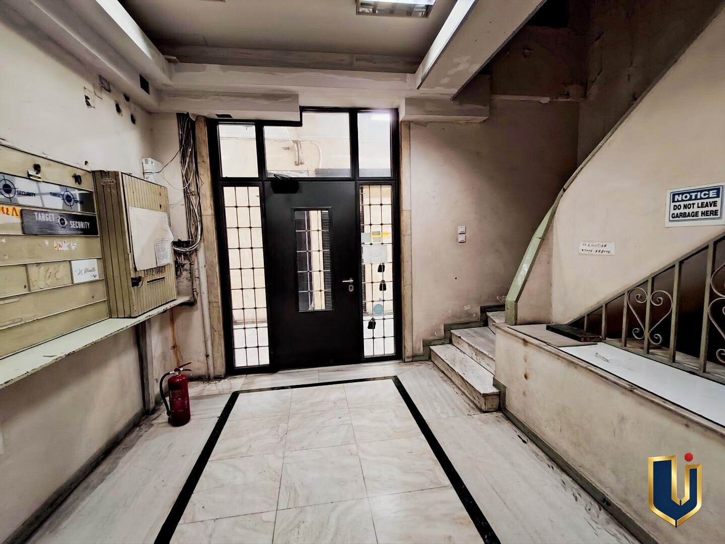 Ground-Floor Exit to Ermou Street Arcade Ground-floor exit of the professional building leading to the internal arcade at 64 Ermou Street, Athens.