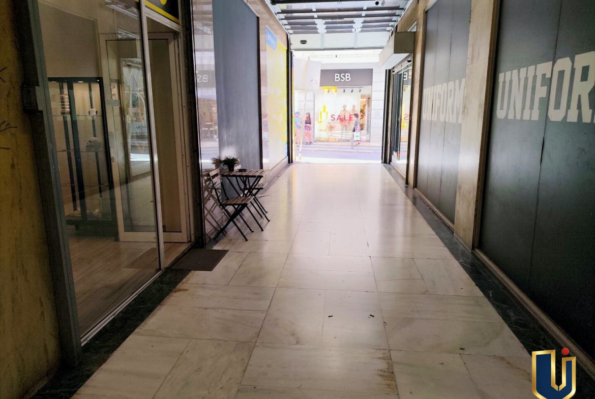 Internal commercial arcade leading directly to Ermou Street from the professional building at number 64, Athens.