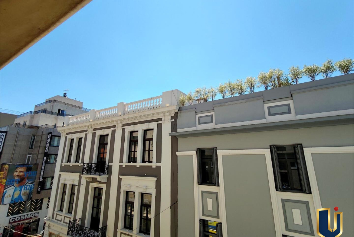 View from the office towards neoclassical buildings near Ermou and Aiolou Streets in central Athens.