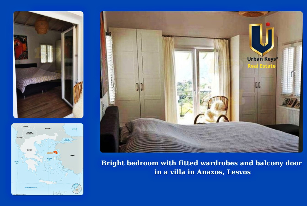 Bright bedroom with fitted wardrobes and balcony door in a villa in Anaxos, Lesvos