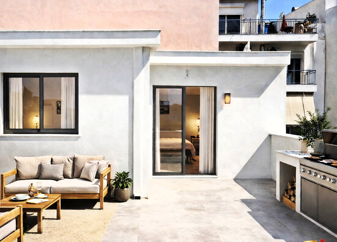 Illustrative rooftop terrace with outdoor seating beside a modern building.