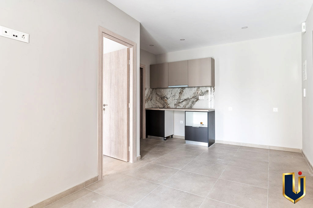 Apartment interior with a compact kitchenette, property 150-1075 in Athens.